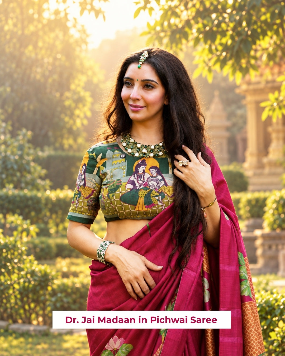 Beautiful Pichwai saree in maroon with intricate traditional designs worn by a model outdoors