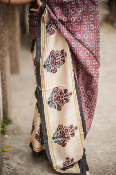 Kawaii elegant block print saree with maroon and cream floral patterns on soft fabric