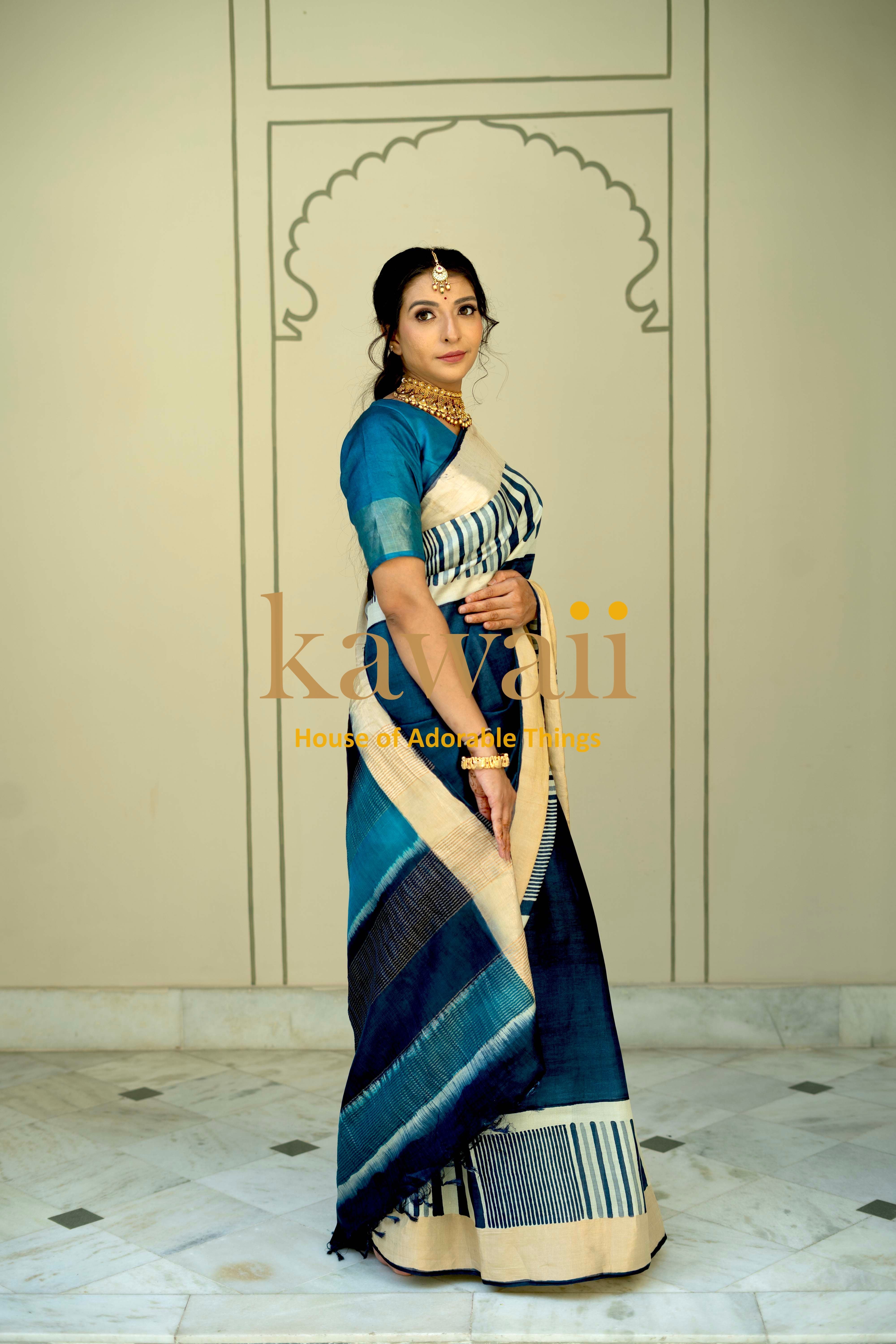 Elegant Block Print Saree in shades of blue made from silk tussar, perfect for festive occasions.