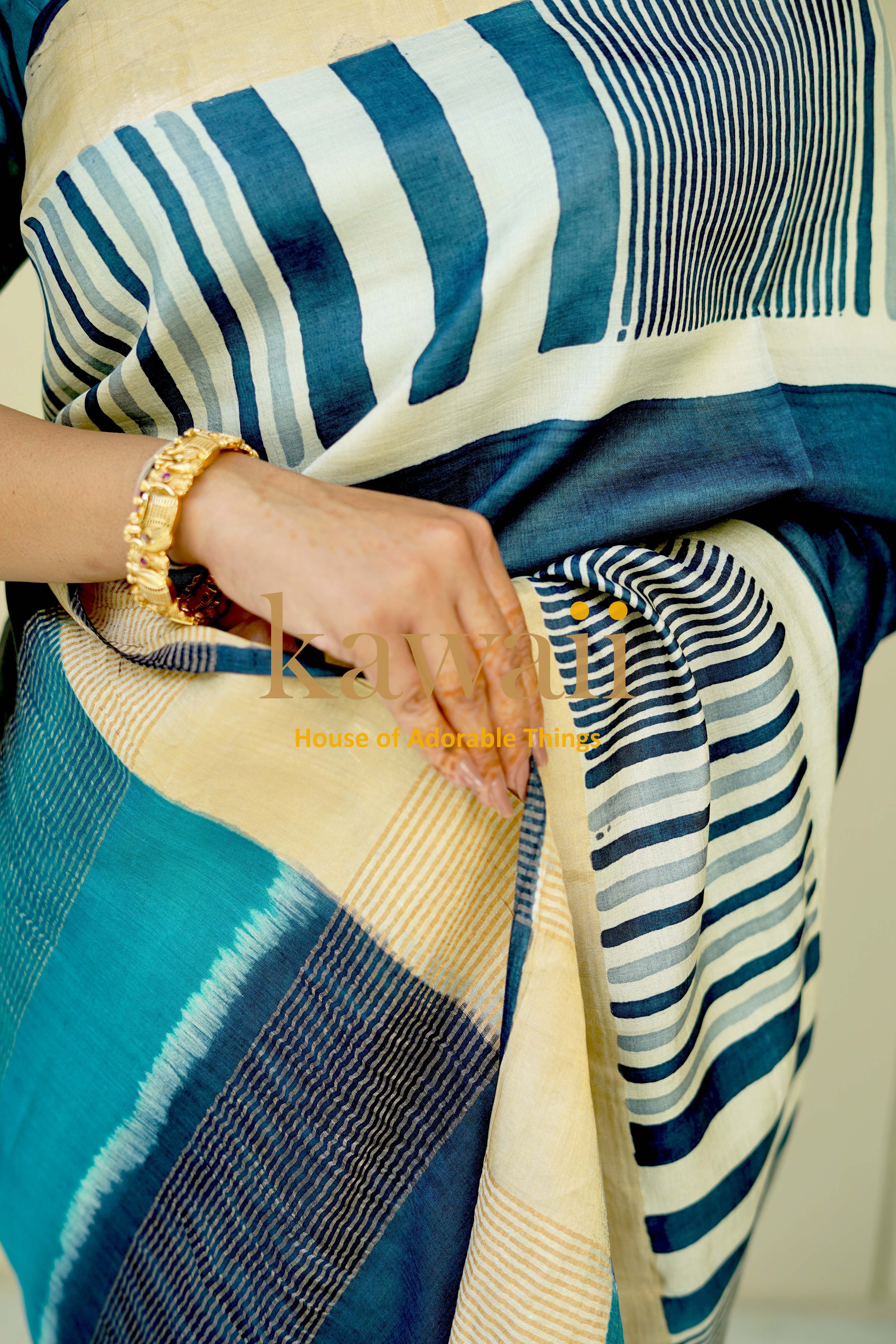 Elegant block print saree in silk tussar with blue and beige patterns, perfect for festive occasions