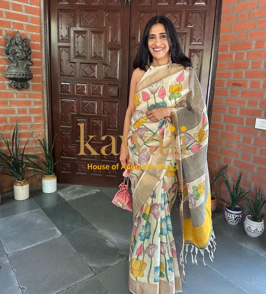 Elegant Kawaii kalamkari saree in pastel floral patterns, handwoven fabric with soft drape