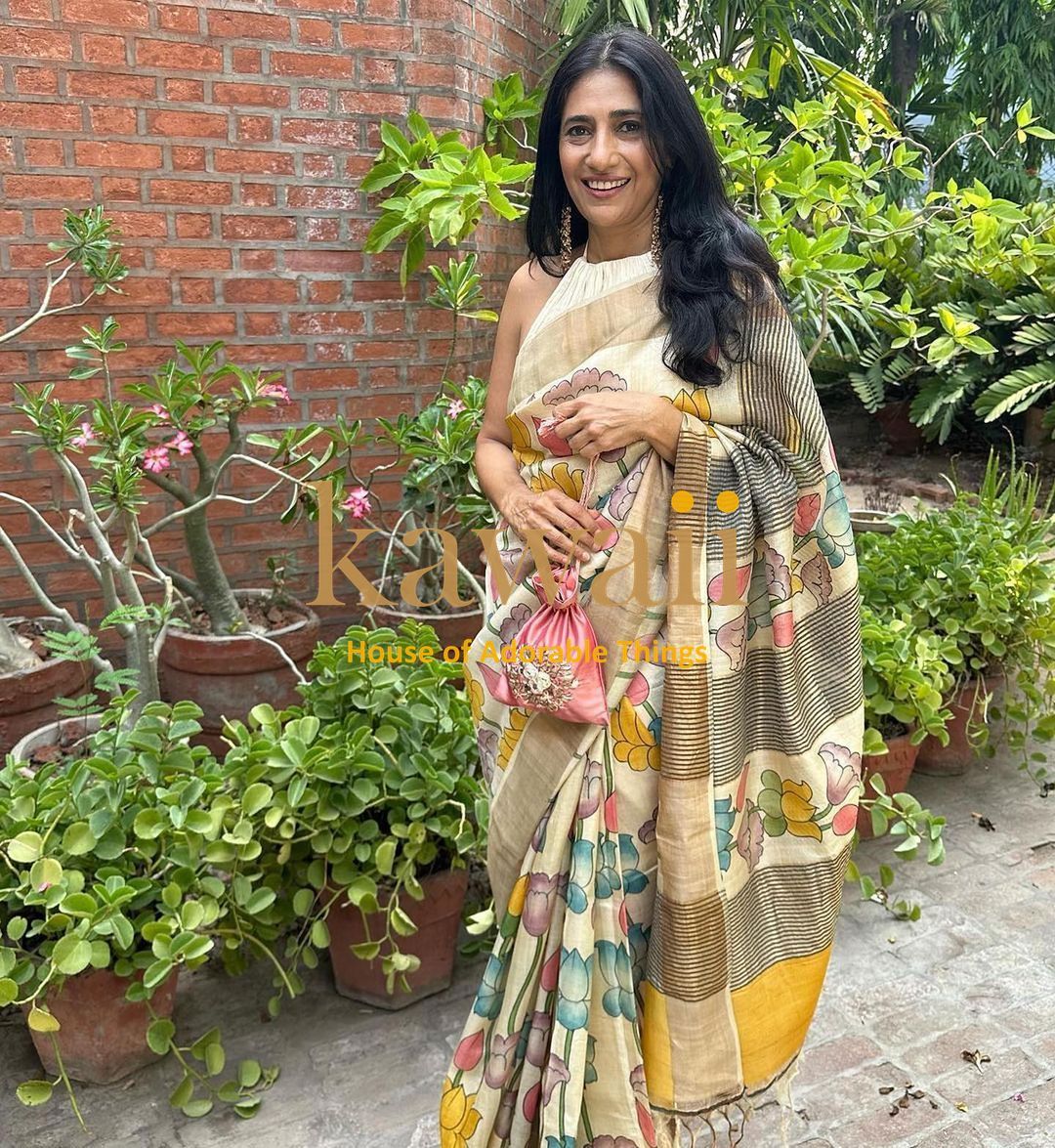 Kalamkari saree in yellow with floral patterns, crafted from lightweight fabric, perfect for casual wear