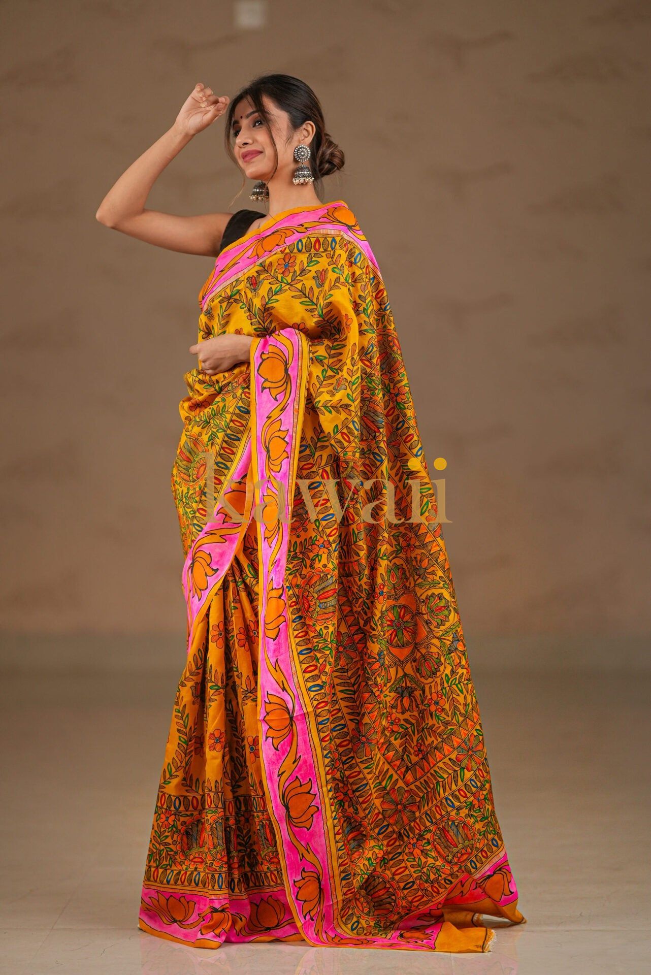 Vibrant Kalamkari Saree in Rich Yellow with Intricate Floral Patterns and Bright Pink Border