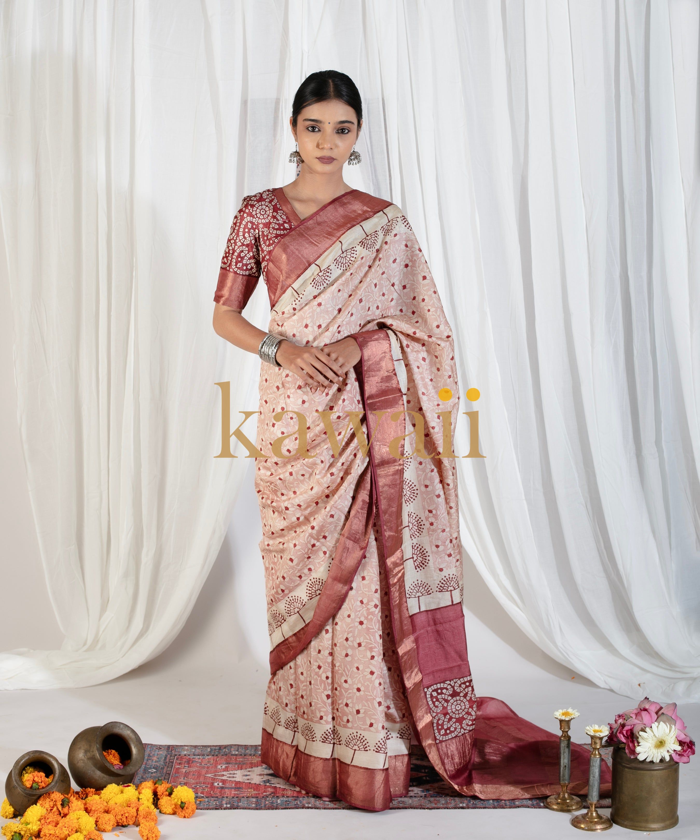 Elegant Kawaii block print saree in soft shades with intricate patterns and matching blouse for festive occasions