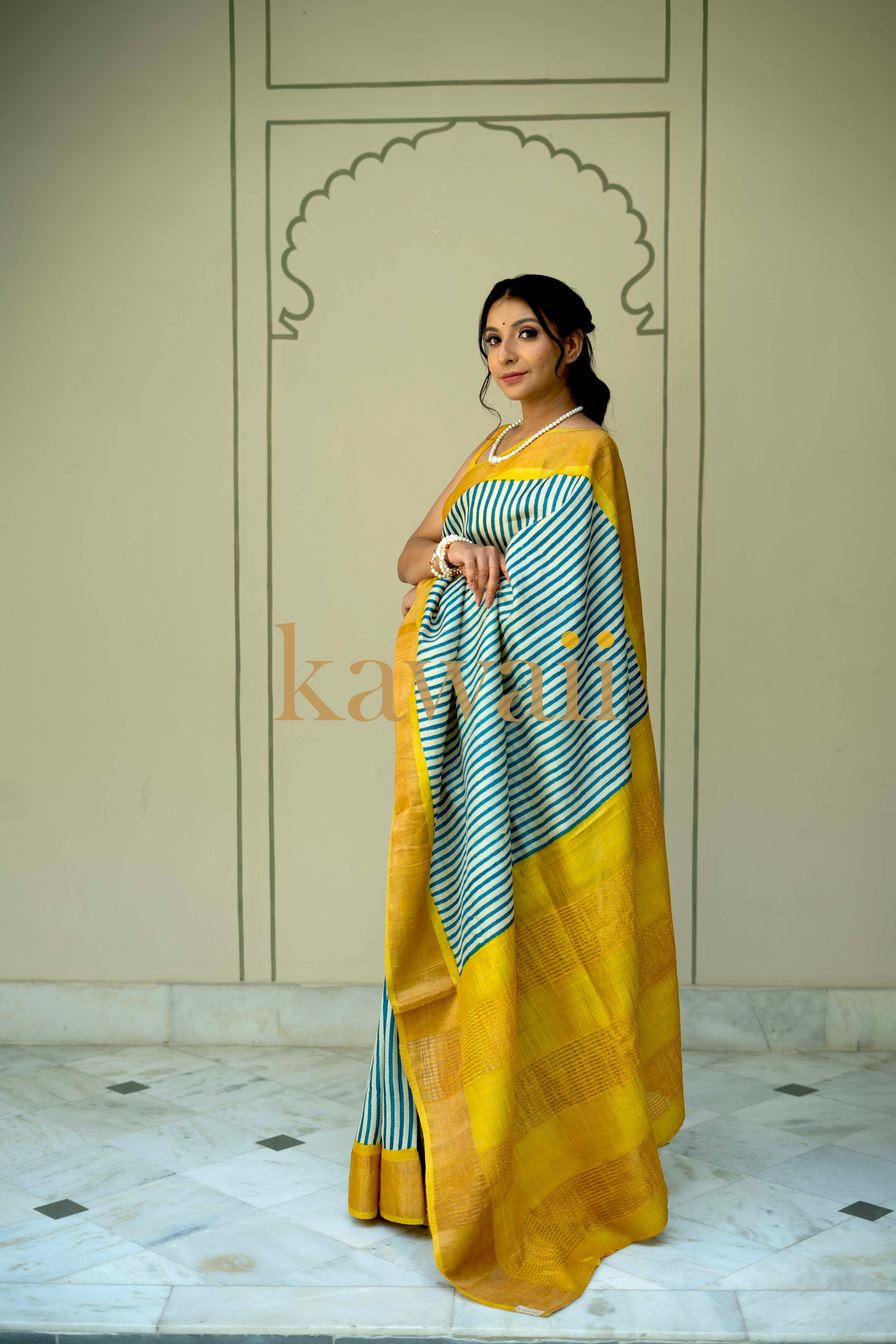 Elegant Kawaii tussar silk saree in yellow and blue block print, showcasing traditional craftsmanship and modern style