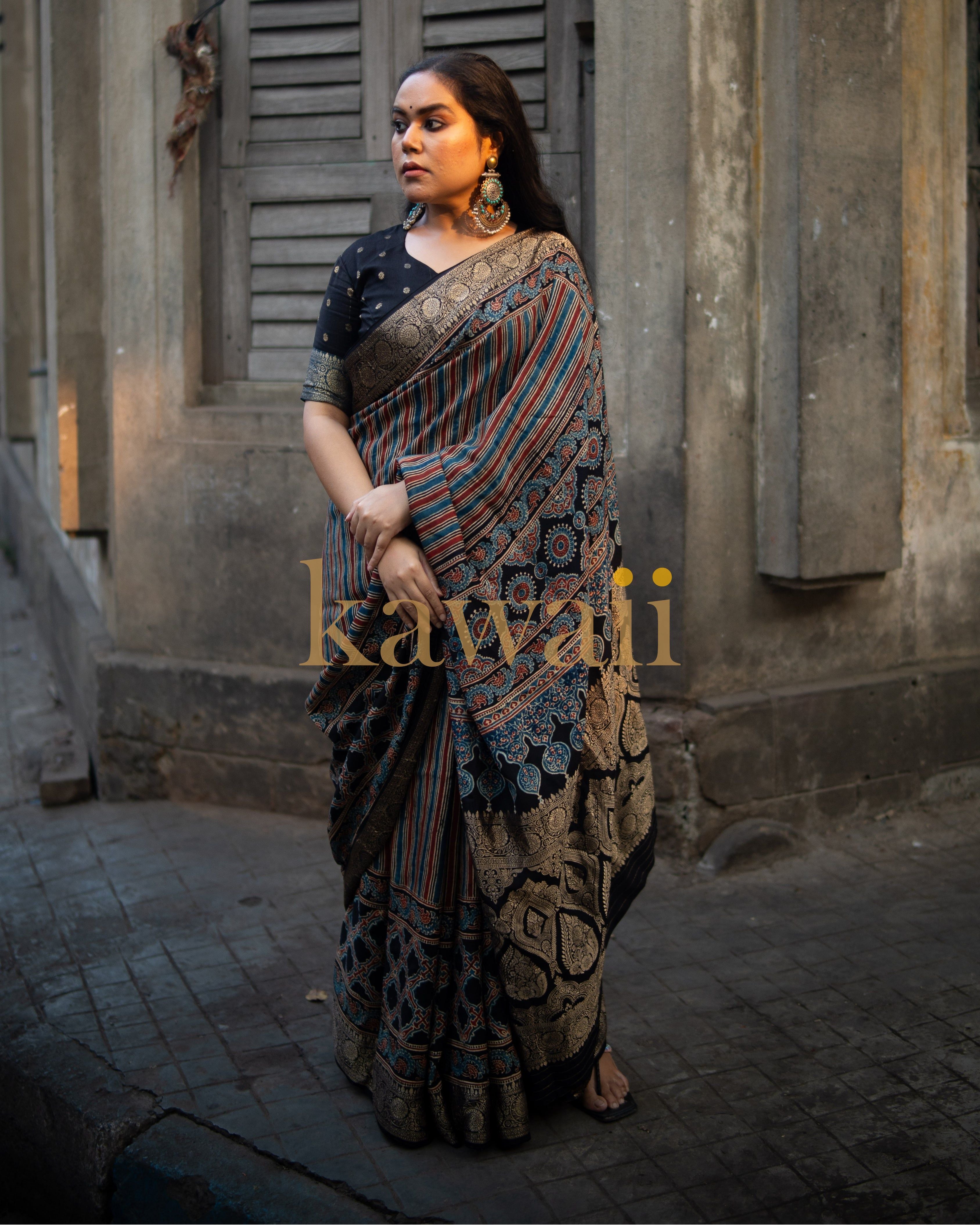 Kawaii ajrakh saree with traditional block print design worn by a woman in an urban setting