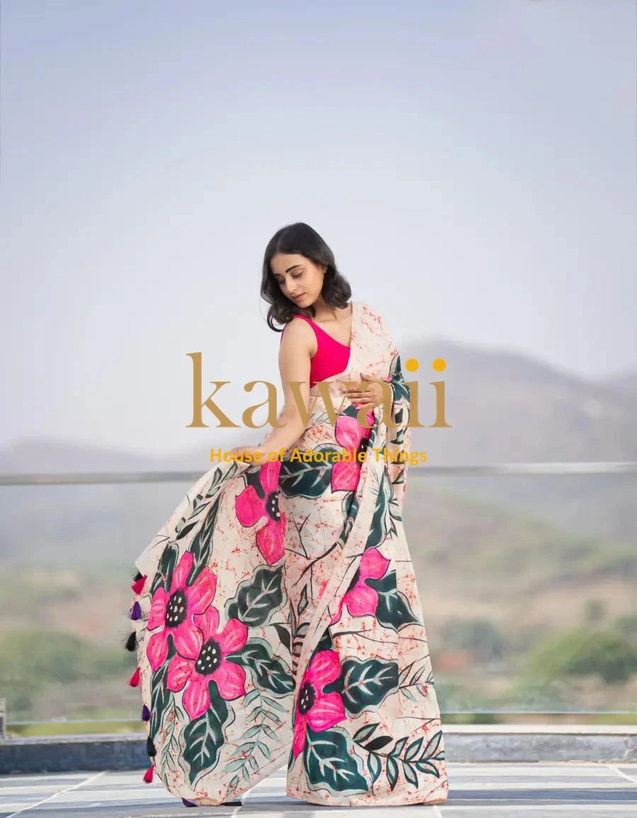 Kawaii batik saree with large pink floral patterns worn by model outdoors
