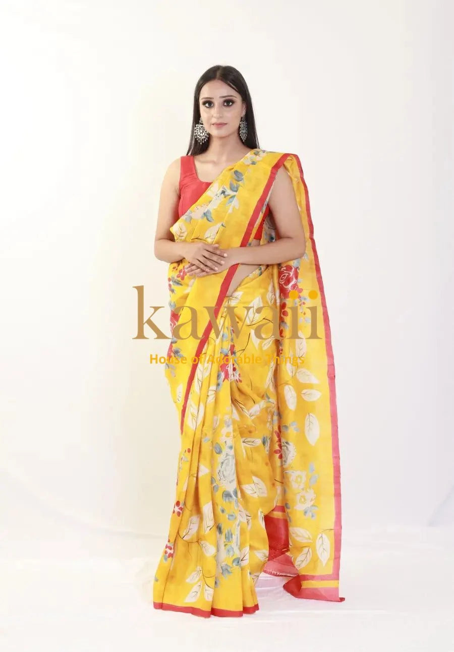 Kawaii yellow and red floral batik saree worn by a woman with sleeveless blouse