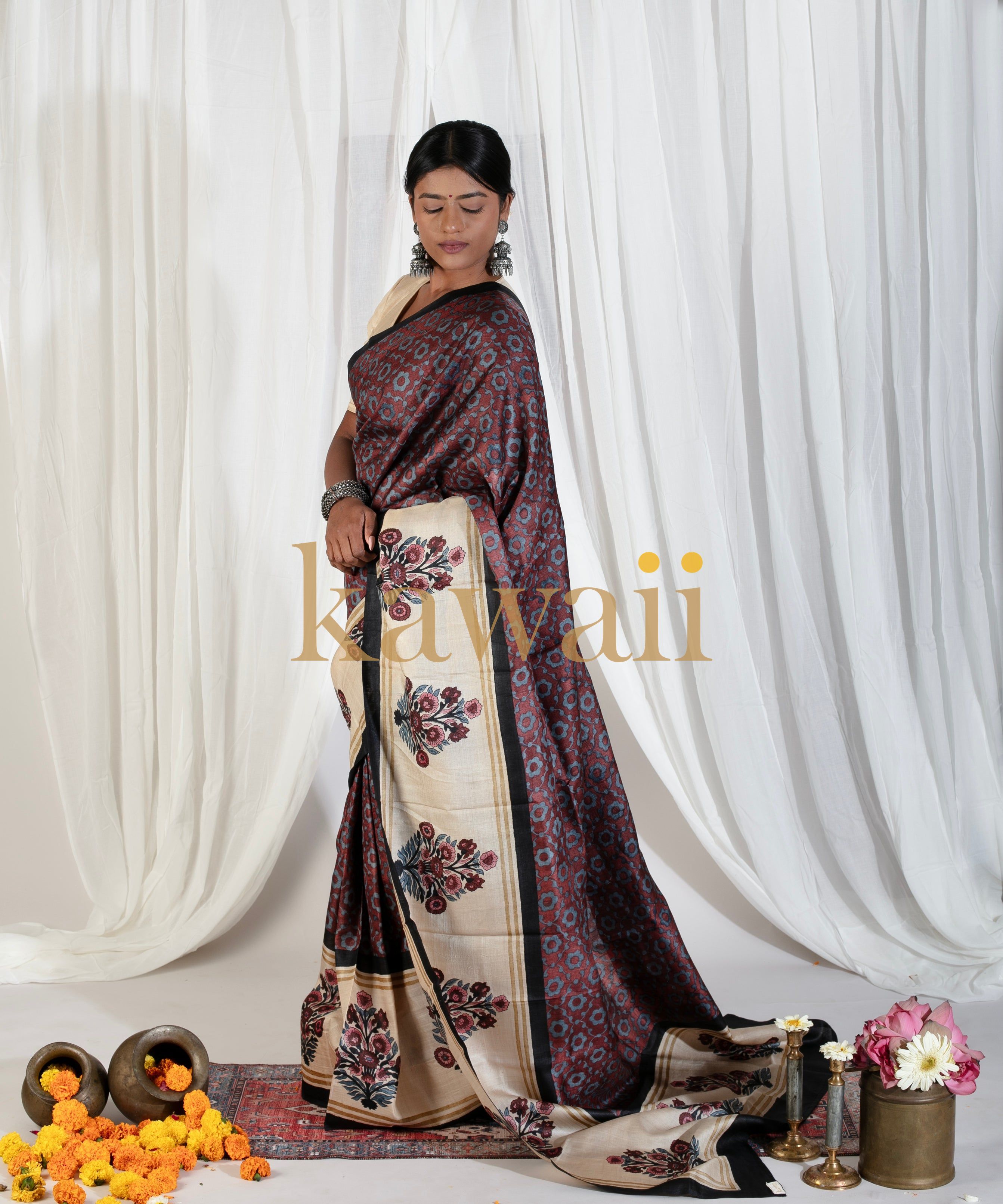 Elegant Kawaii block print saree with floral patterns in maroon and beige worn by model