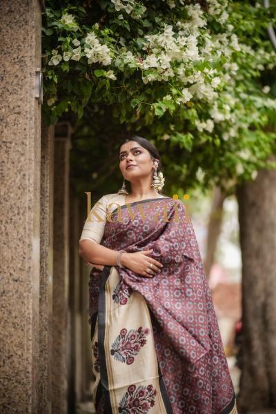 Elegantly draped block print saree featuring floral patterns, ideal for festive occasions
