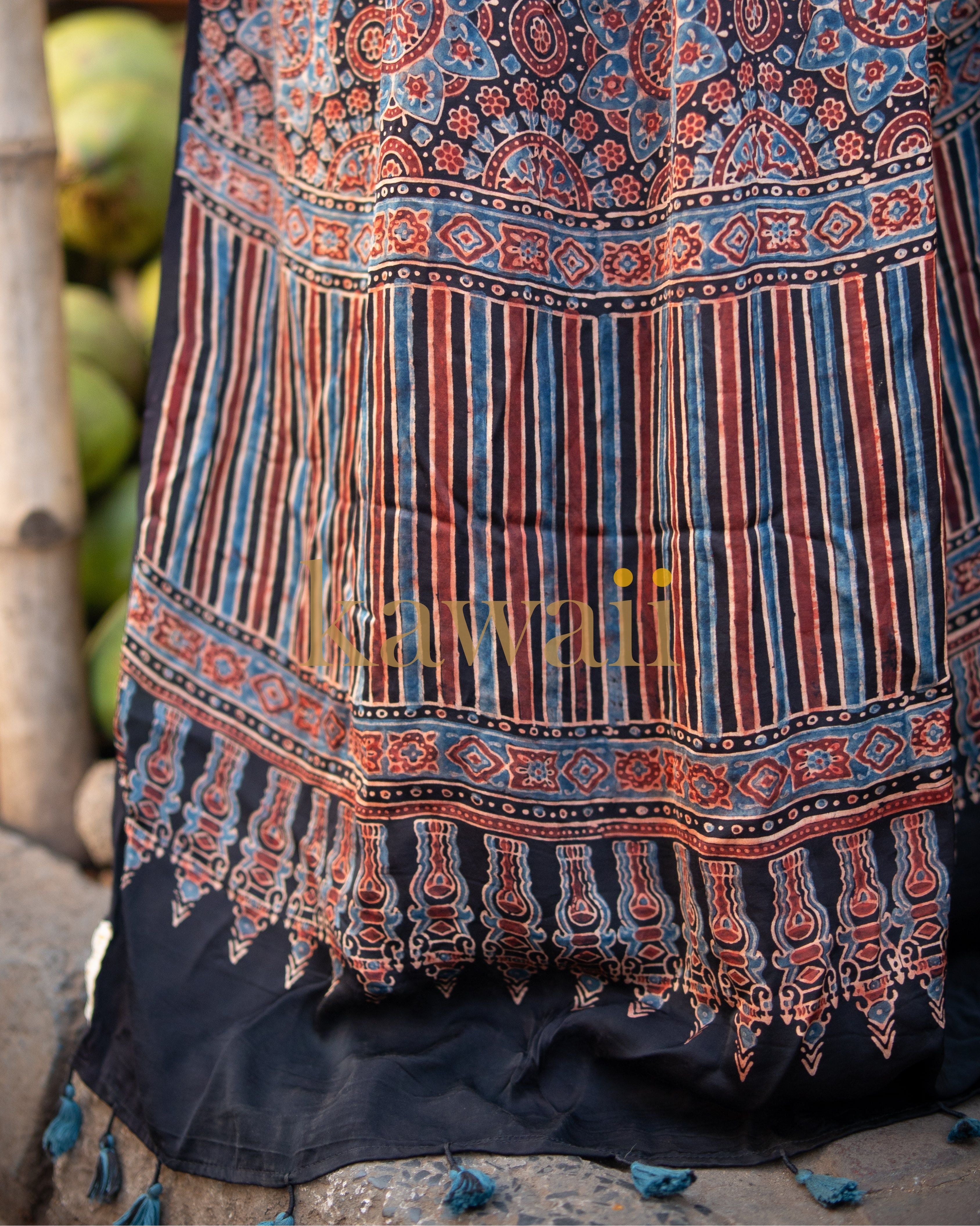 Kawaii handcrafted ajrakh saree with detailed traditional patterns in blue, red, and beige colors