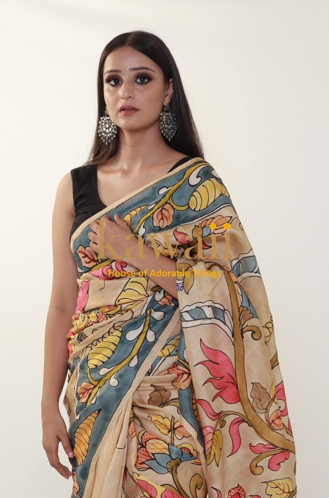 Kawaii kalamkari saree with intricate multicolor floral and leaf patterns worn by model