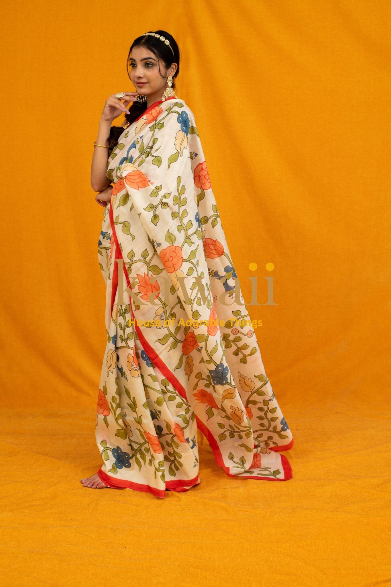 Kawaii kalamkari saree online with floral handcrafted sarees in india design worn by woman
