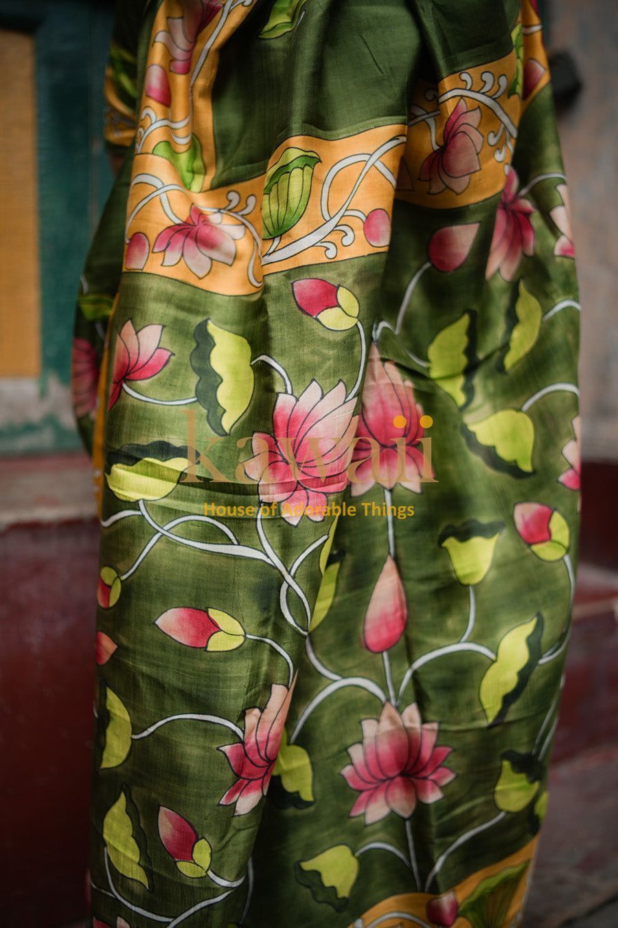 Kawaii green pichwai saree featuring intricate floral and leaf patterns with pink lotus designs