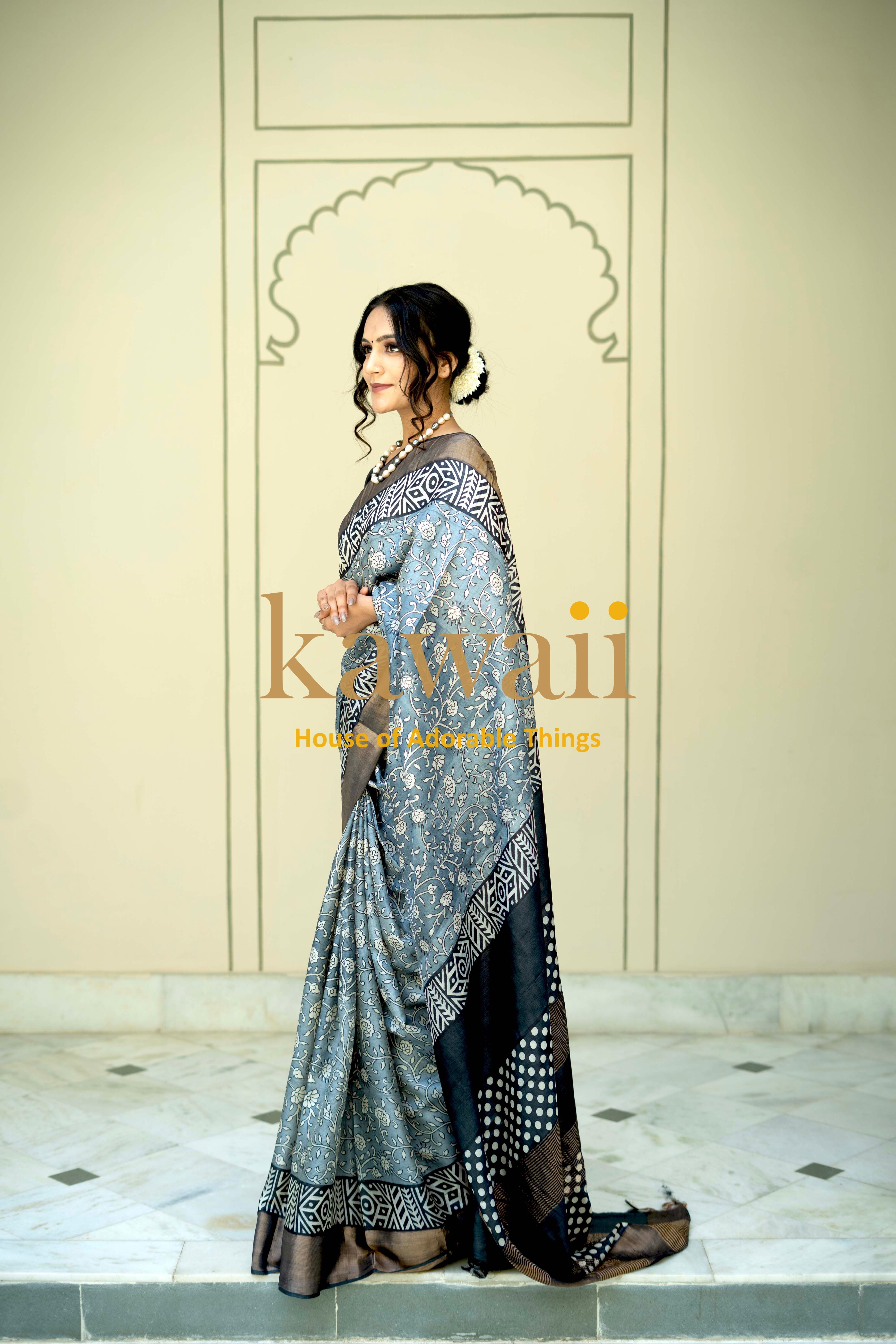Elegant block print saree in silk tussar showcasing intricate designs and a stylish draping