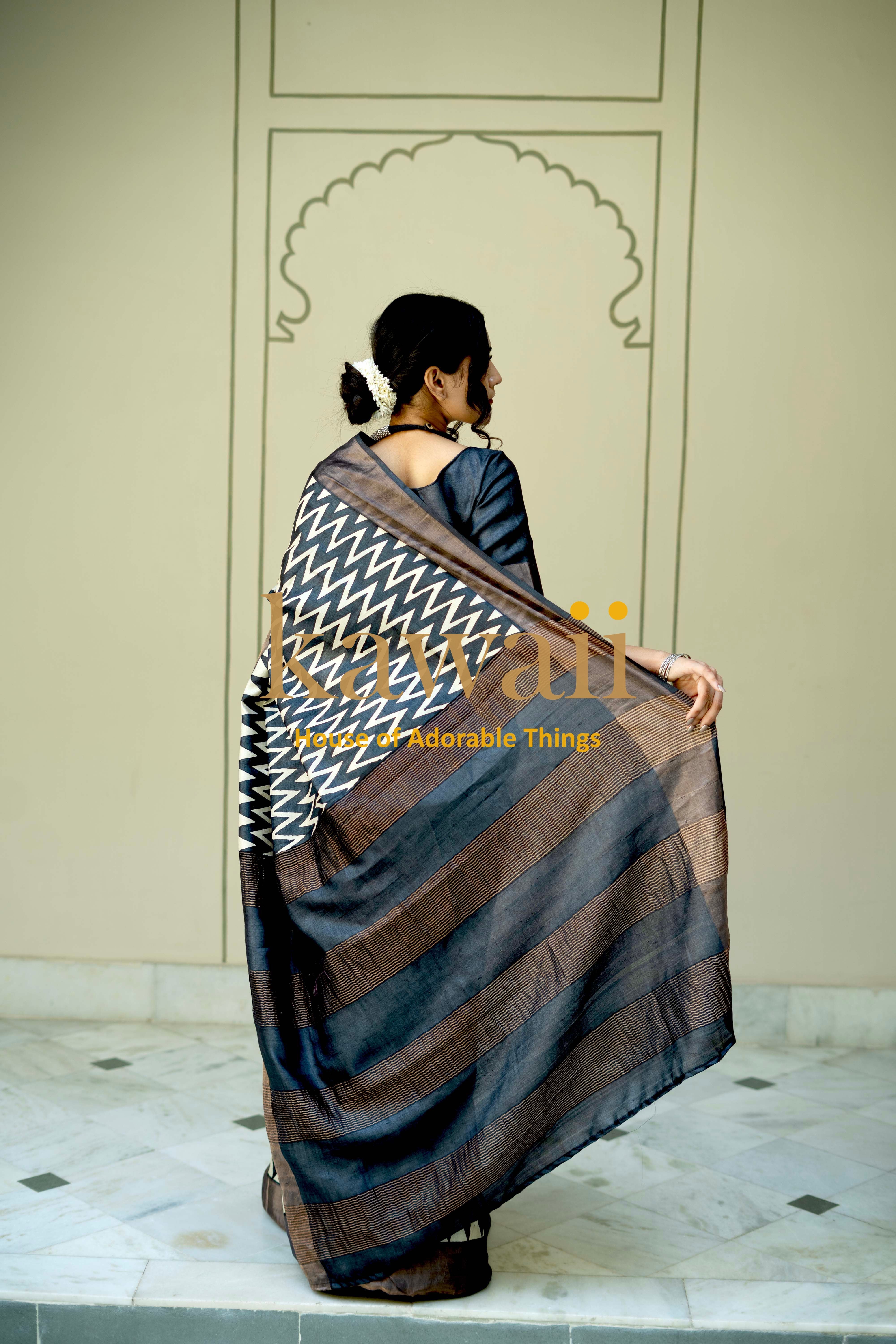 Elegant block print saree in tussar silk with striking zigzag pattern and rich colors