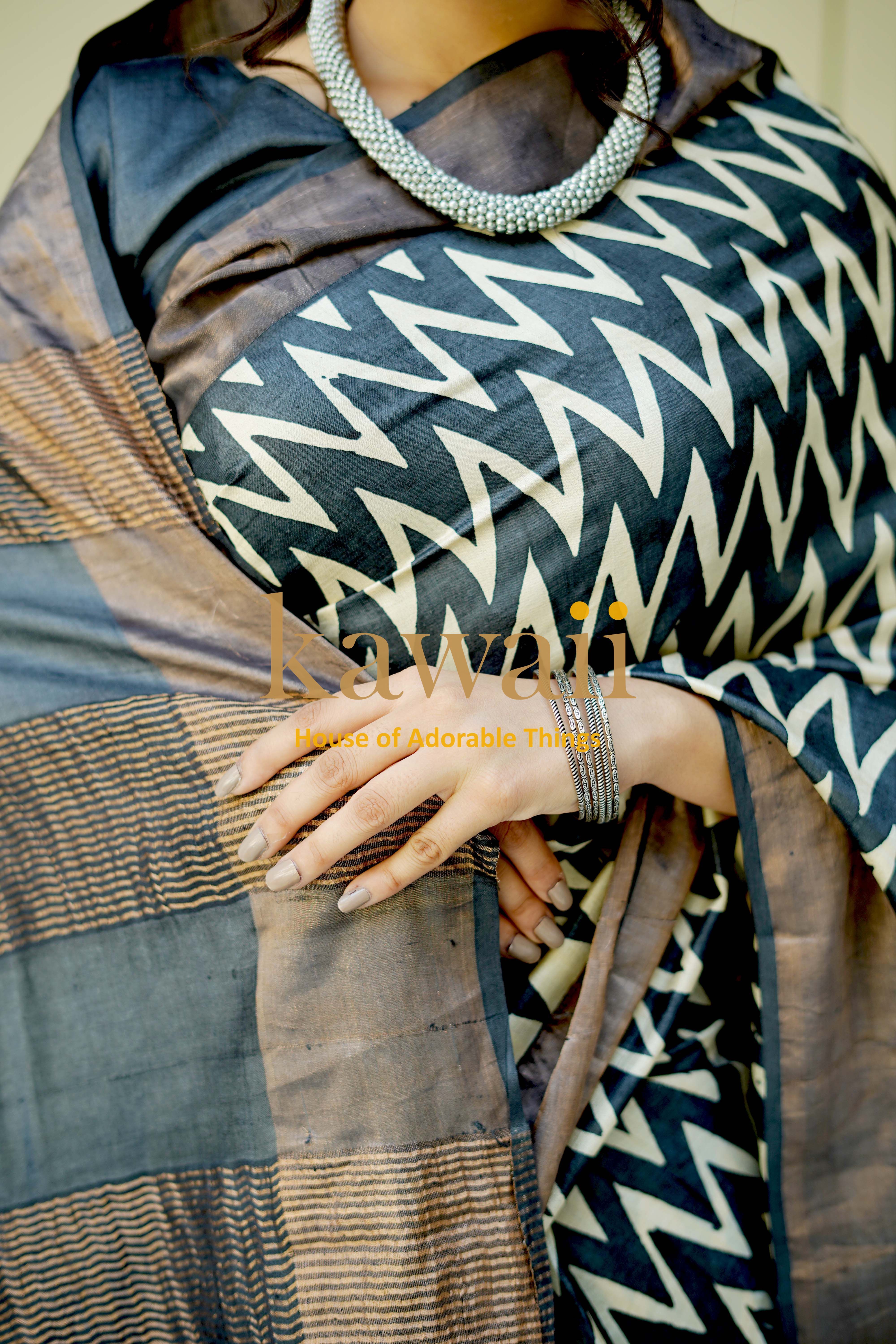 Elegant Kawaii tussar silk saree featuring a unique block print design in black and beige
