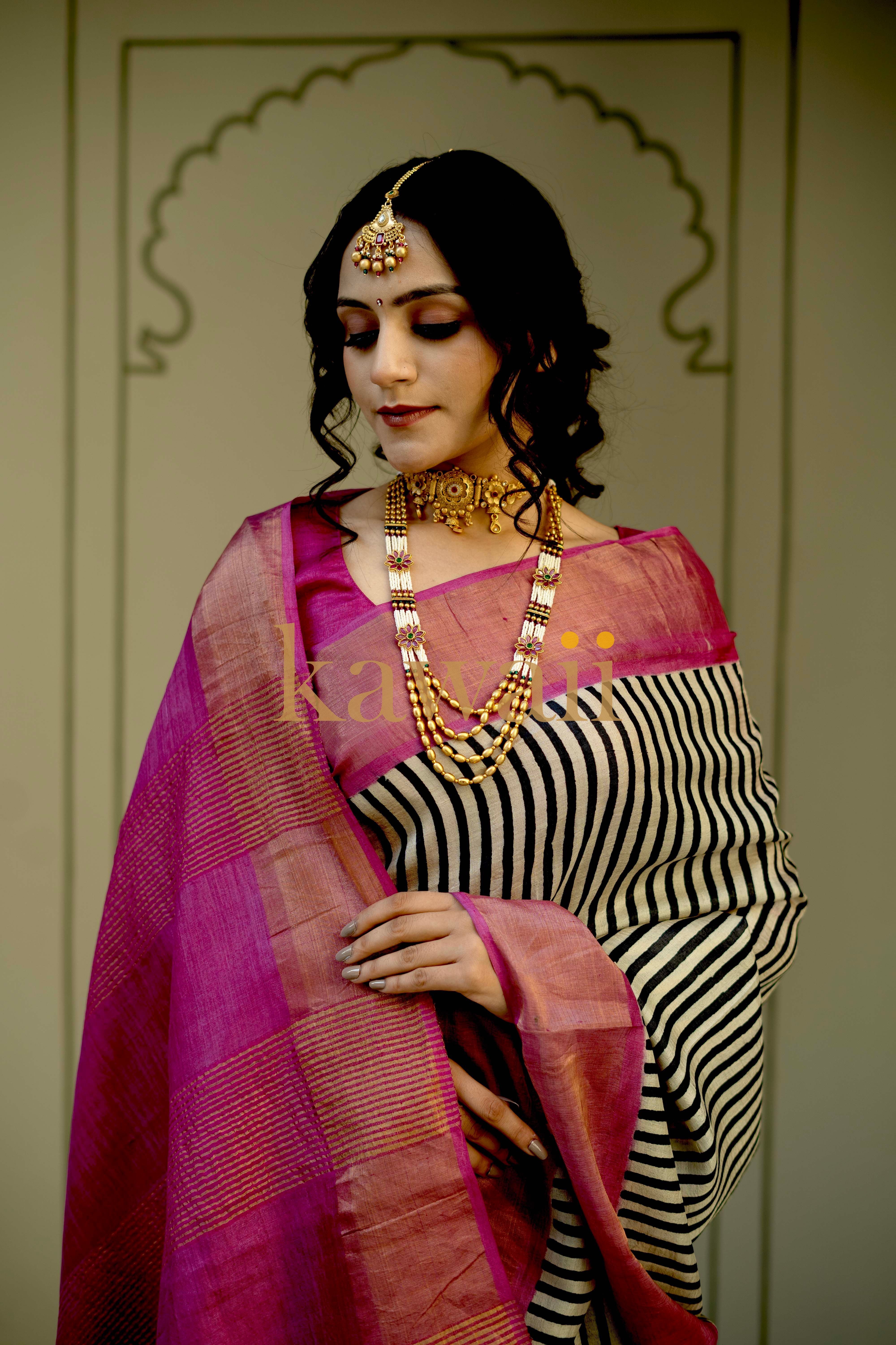 Elegant Kawaii block print tussar silk saree with striking striped design and vibrant pink border