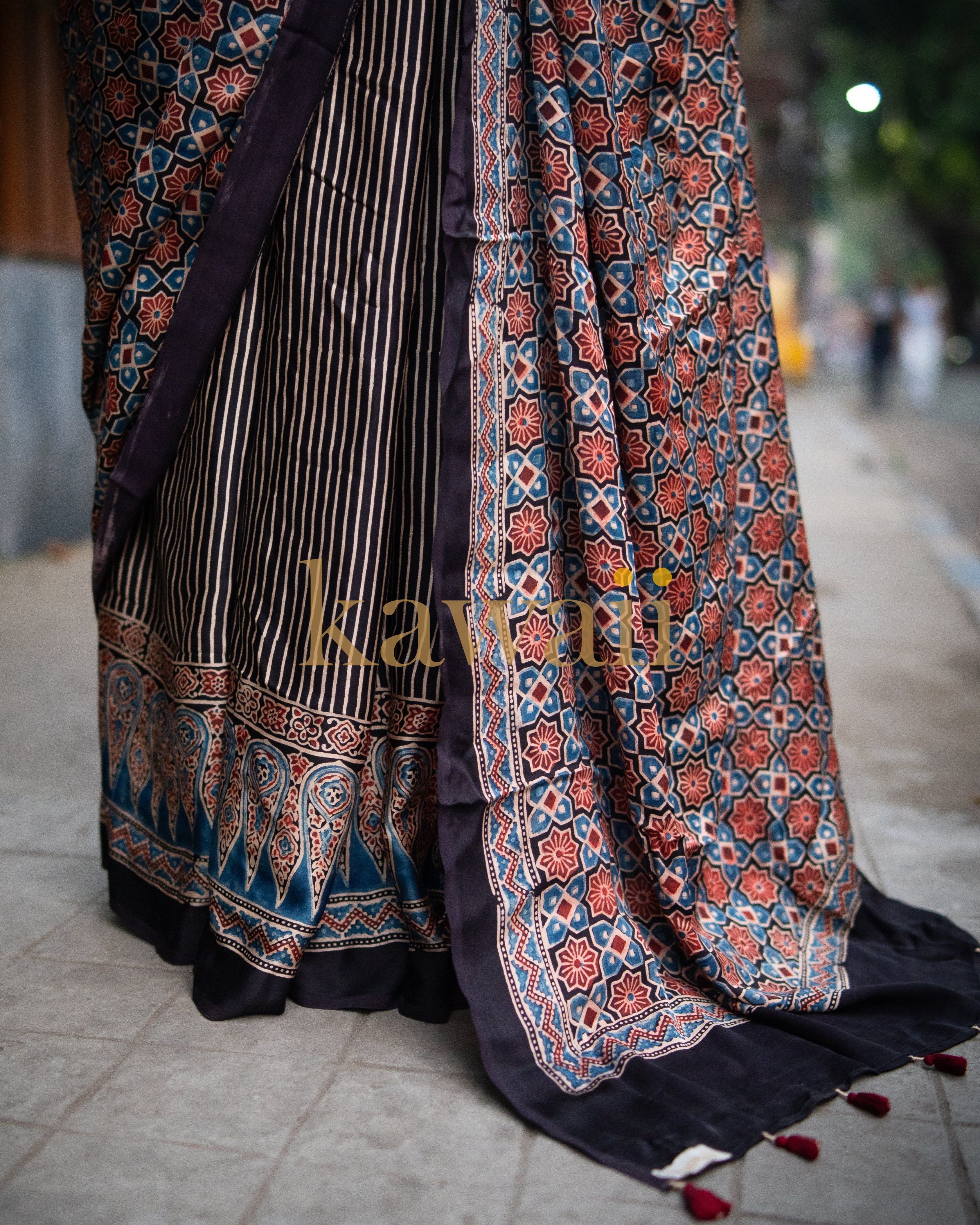 Kawaii best authentic ajrakh saree with traditional intricate patterns and vibrant colors draped elegantly