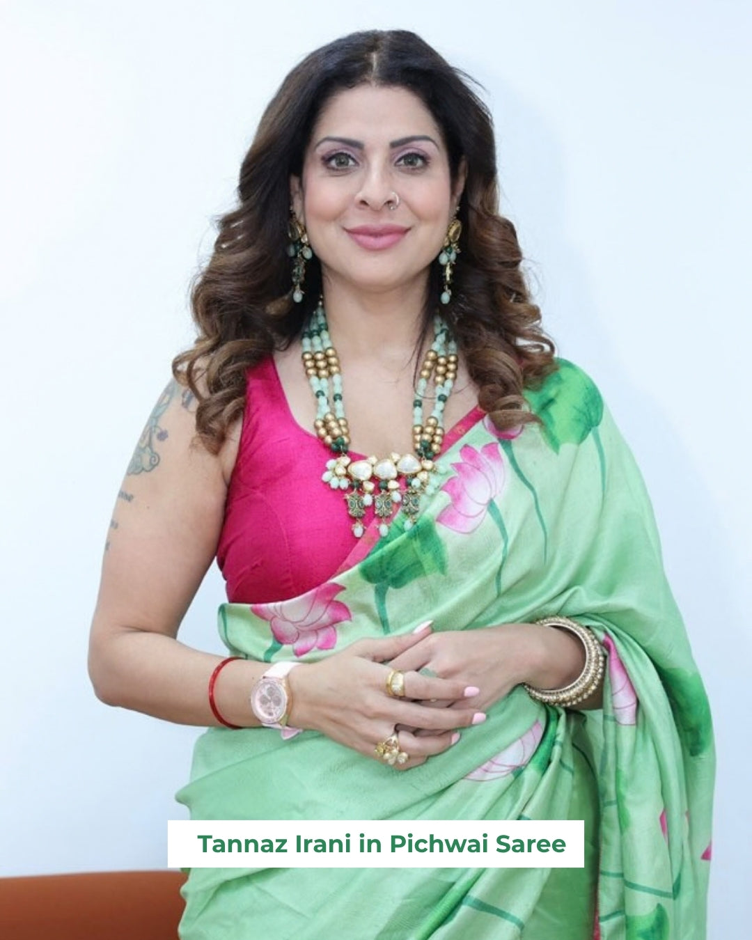 Elegant green Pichwai saree with floral motifs, made from soft fabric for festive occasions