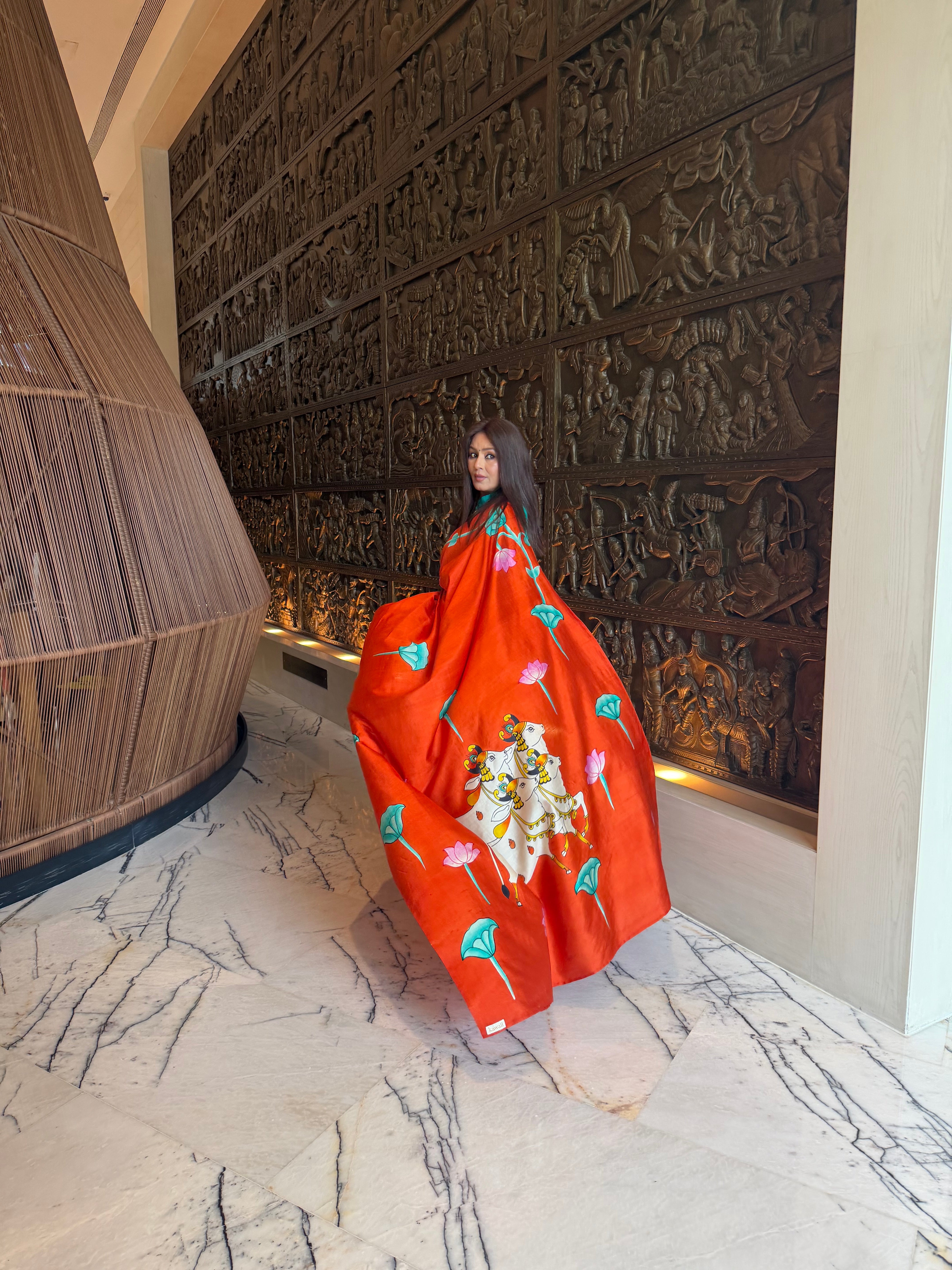 Elegant Kawaii pichwai saree in vibrant orange with intricate floral and animal designs